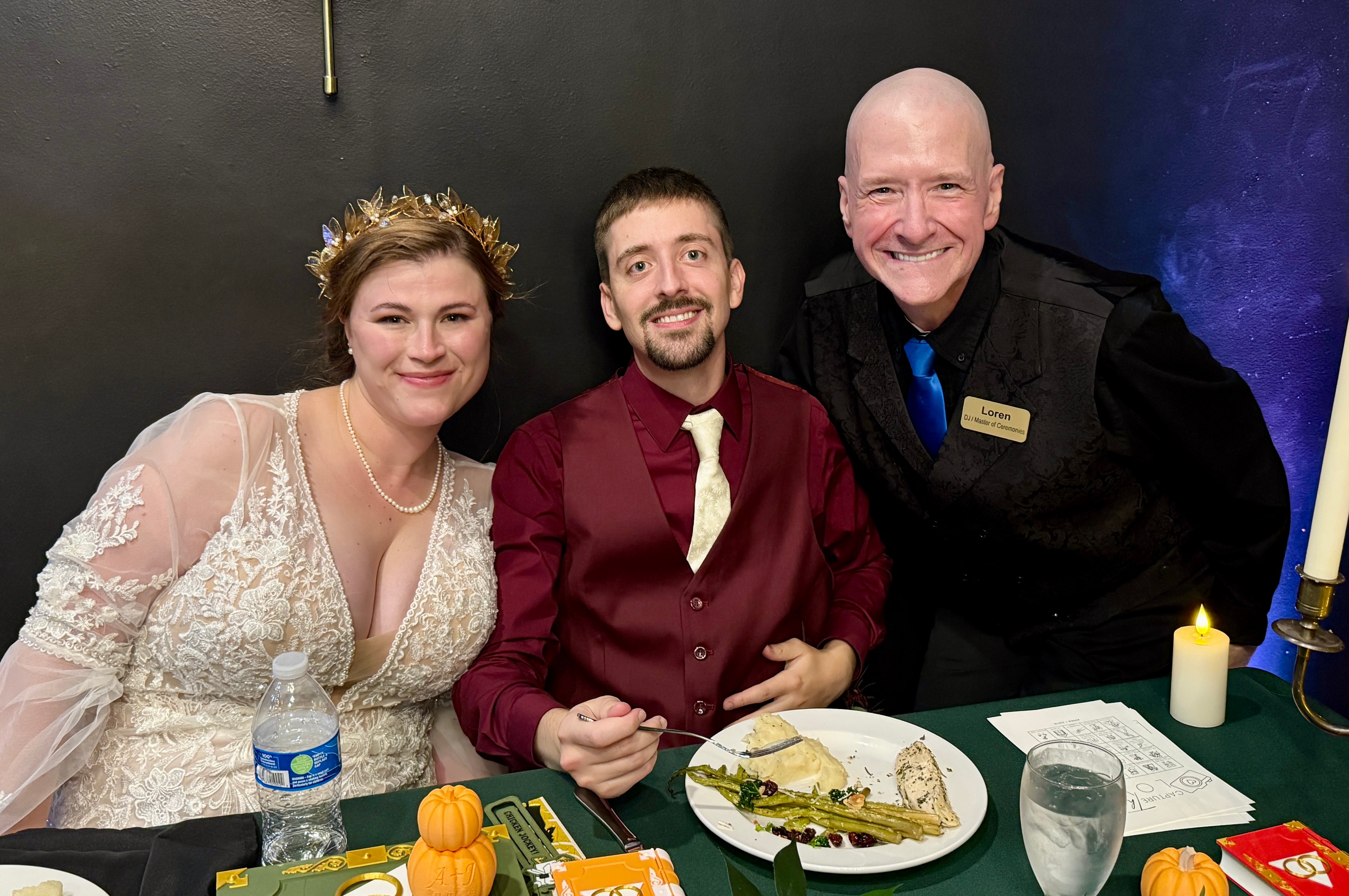 Mahl-Hill couple with their DJ at The Forge on Fourth